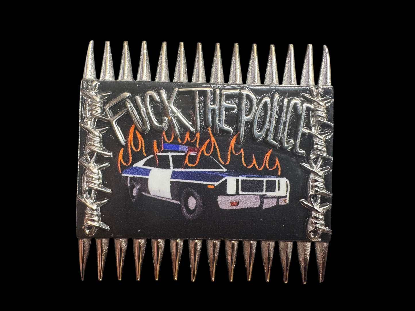 burning cop car pin