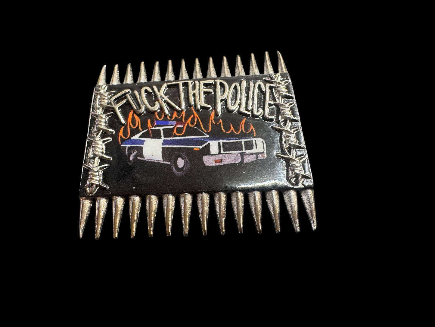 burning cop car pin