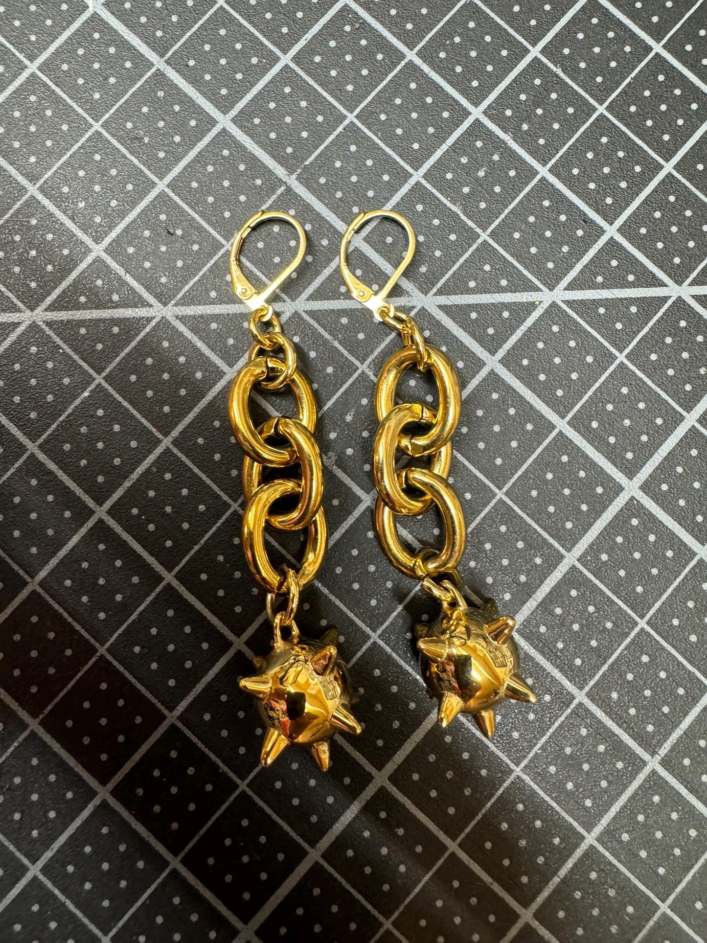 Gold flail earrings
