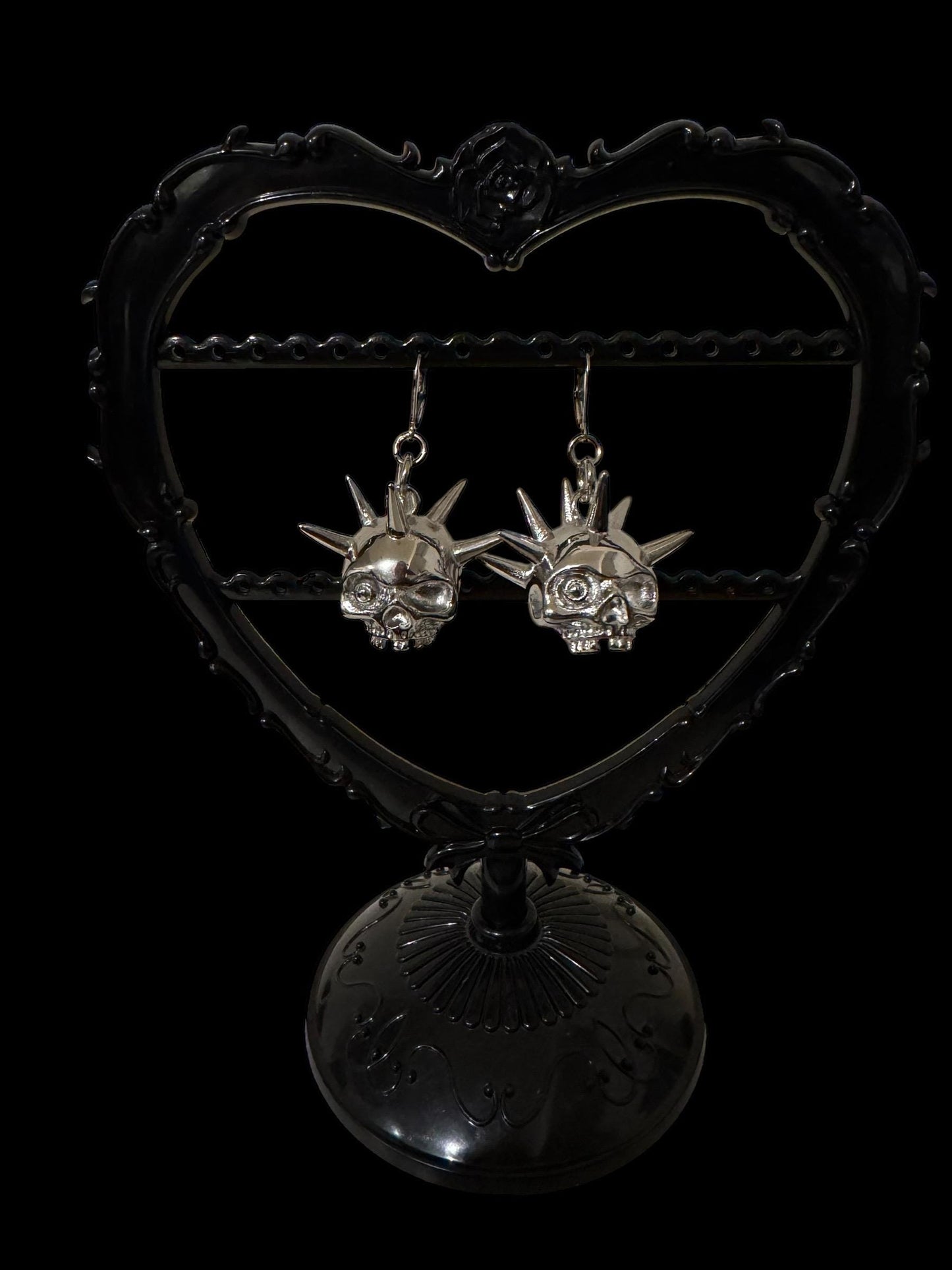 Spiked skull flail earrings