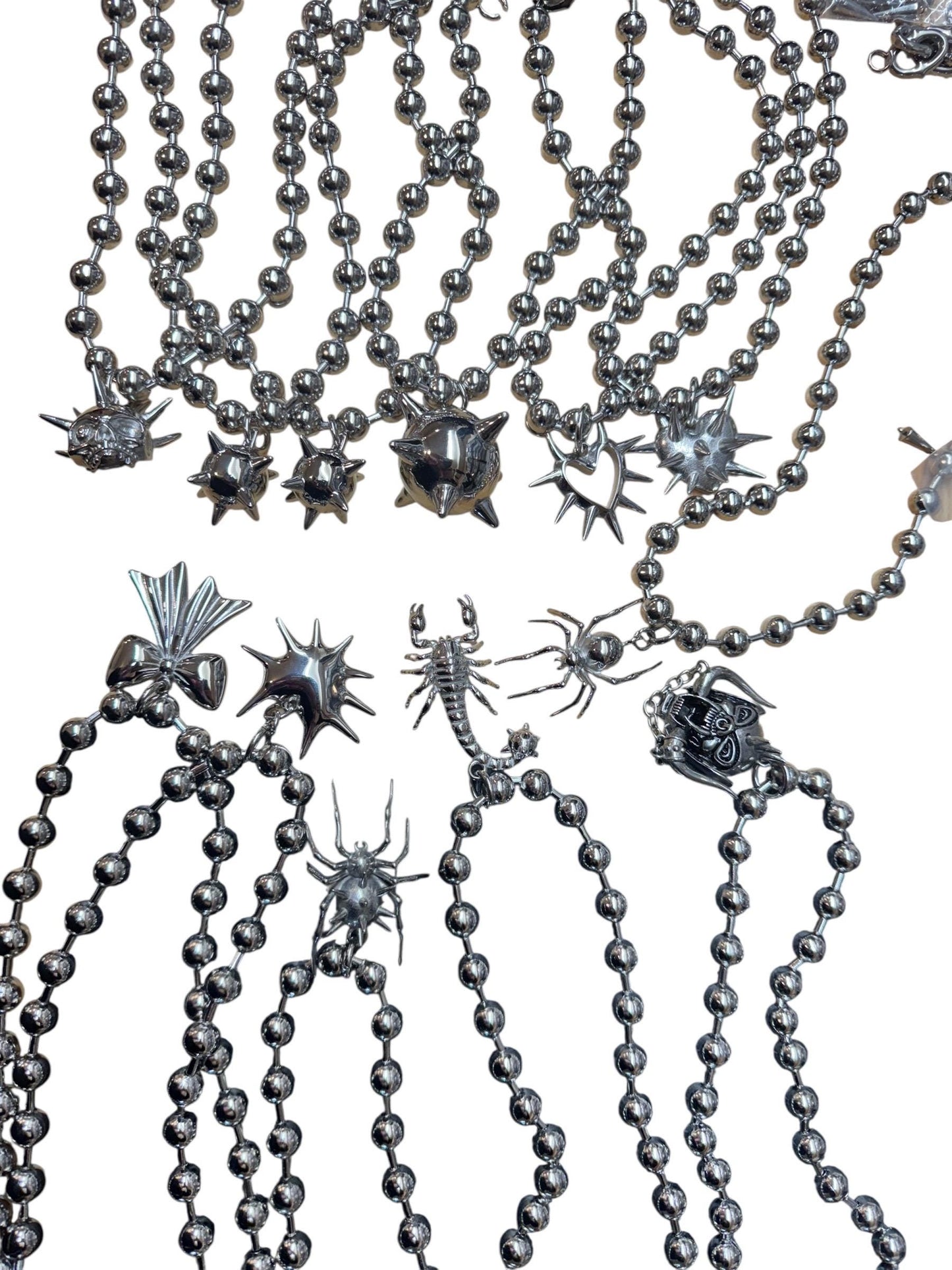 Ball chains, pendant chains, mace, hearts, spiders, medieval themed