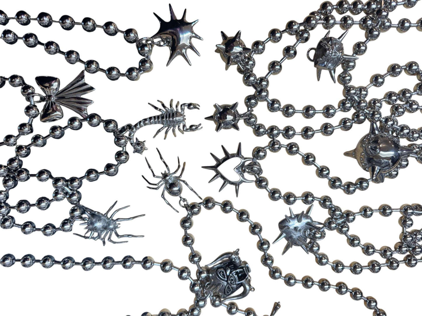 Ball chains, pendant chains, mace, hearts, spiders, medieval themed