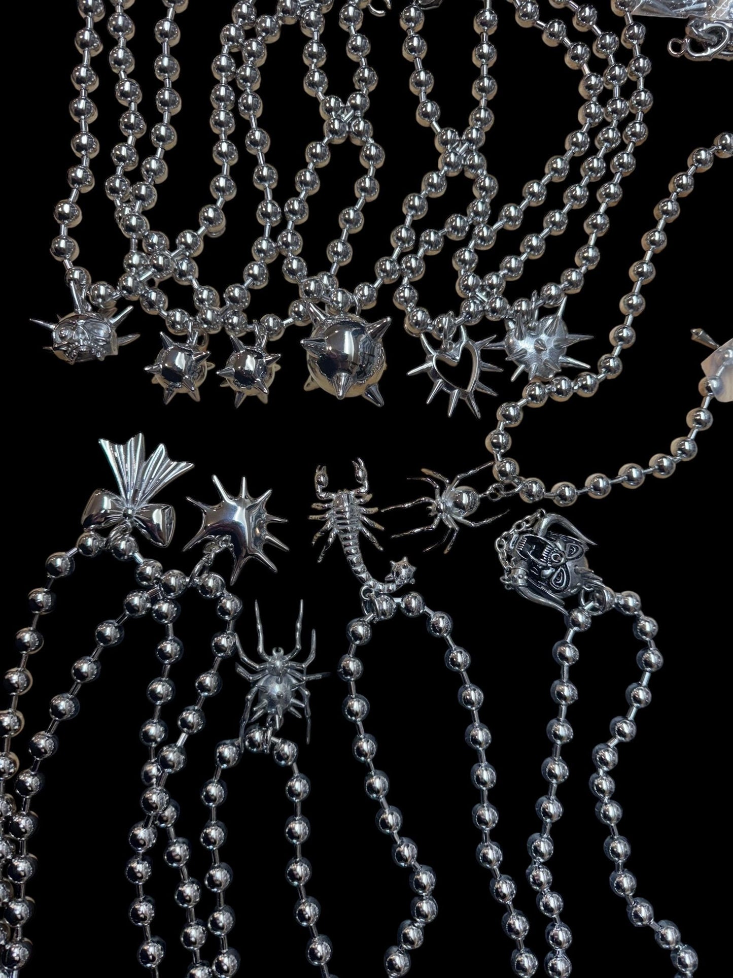 Ball chains, pendant chains, mace, hearts, spiders, medieval themed