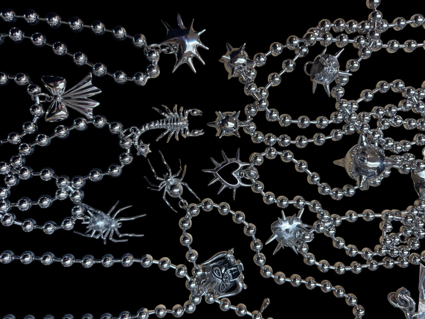 Ball chains, pendant chains, mace, hearts, spiders, medieval themed