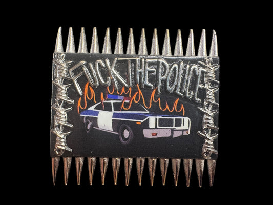 burning cop car pin