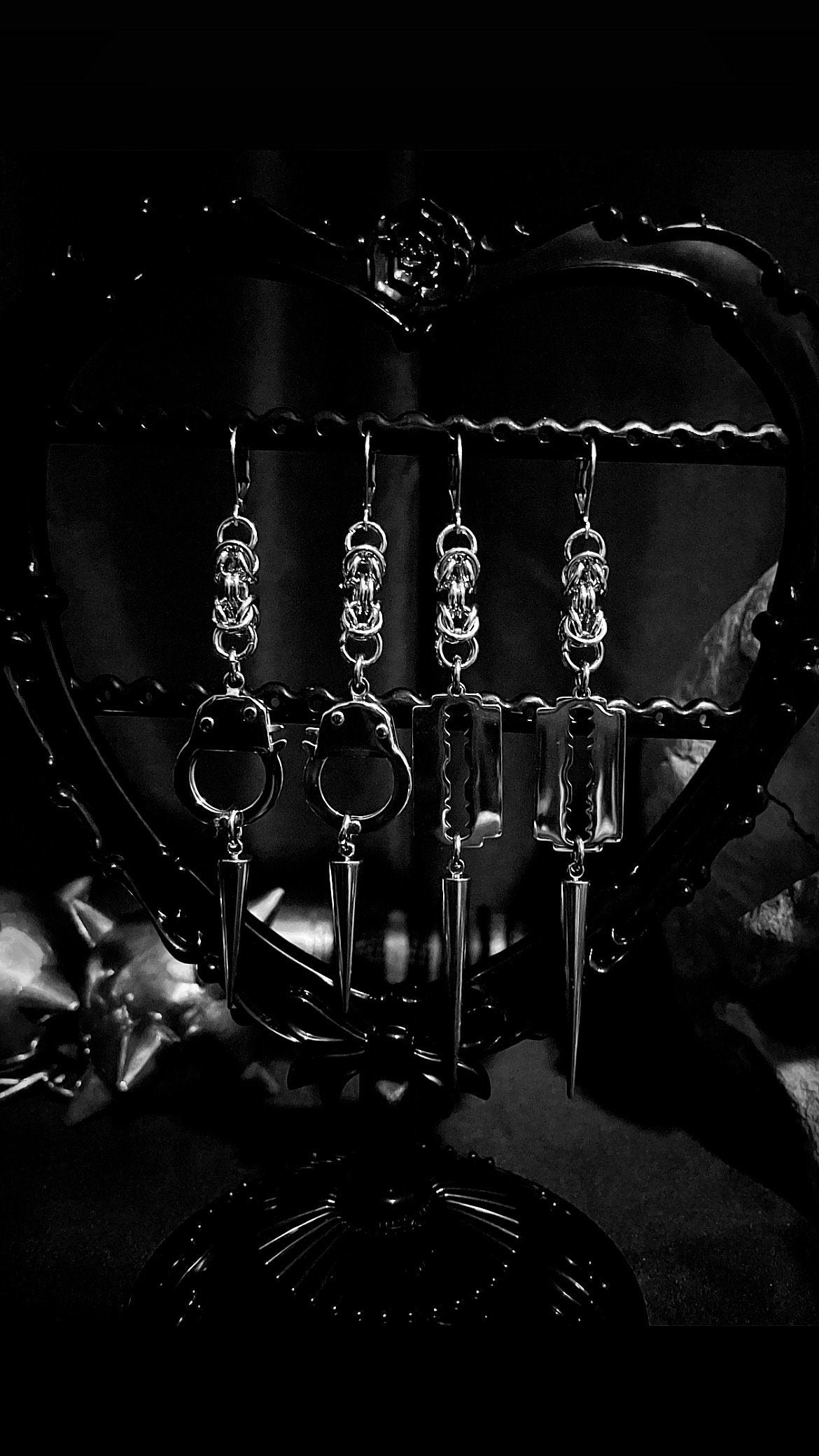 Spiked razor blade/ handcuff earrings
