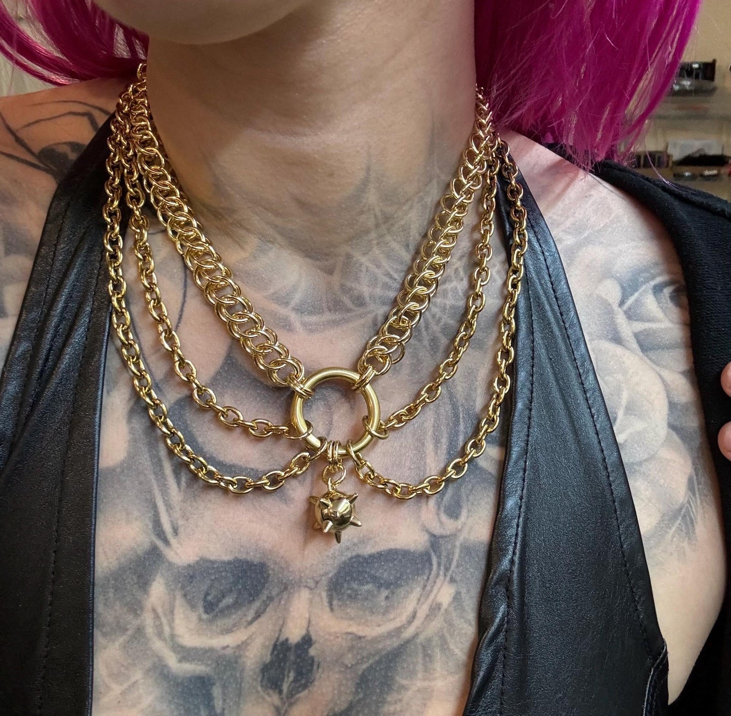 Gold flail, mace, necklace