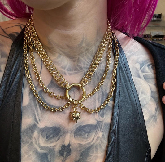 Gold flail, mace, necklace