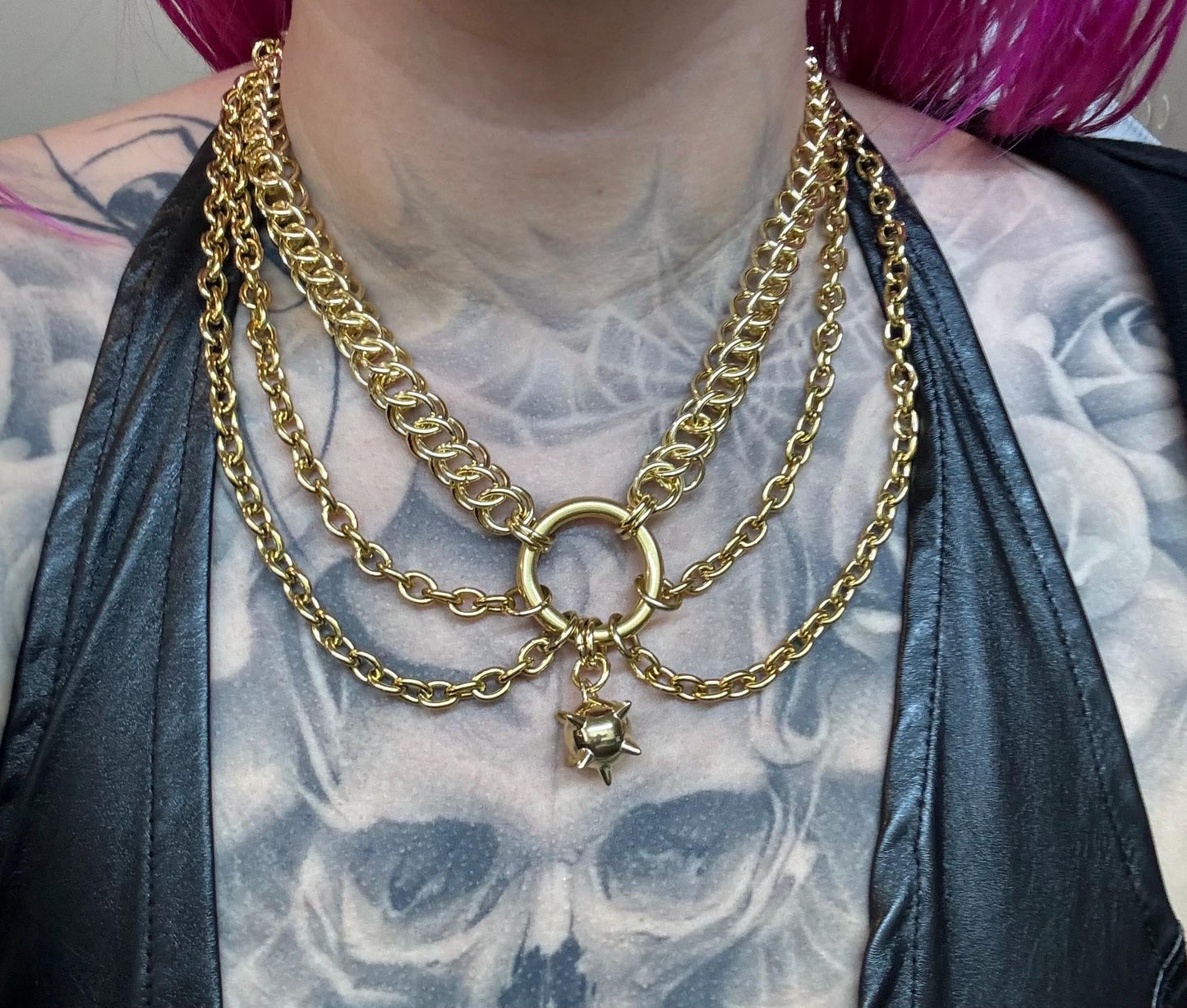 Gold flail, mace, necklace