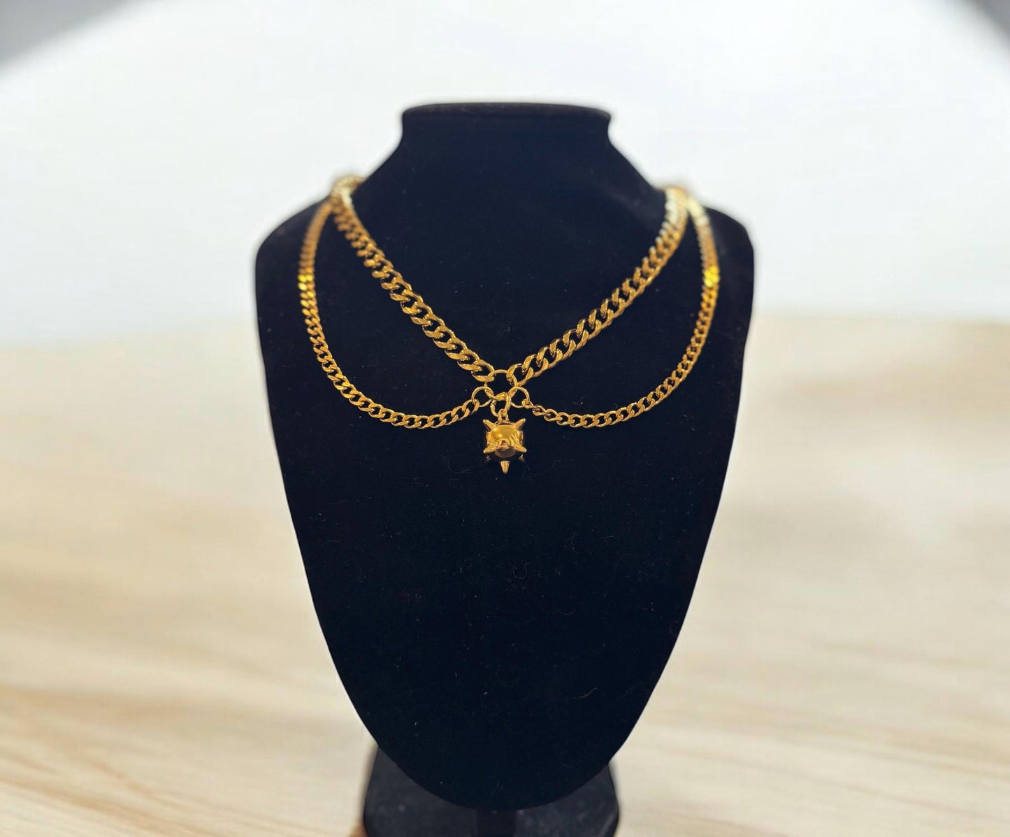 Gold flail drop chain